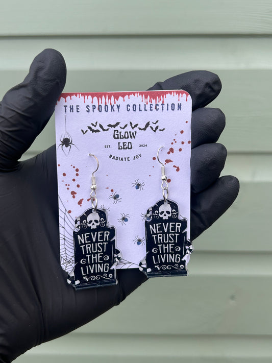 Never Trust The Living Dangle Earrings